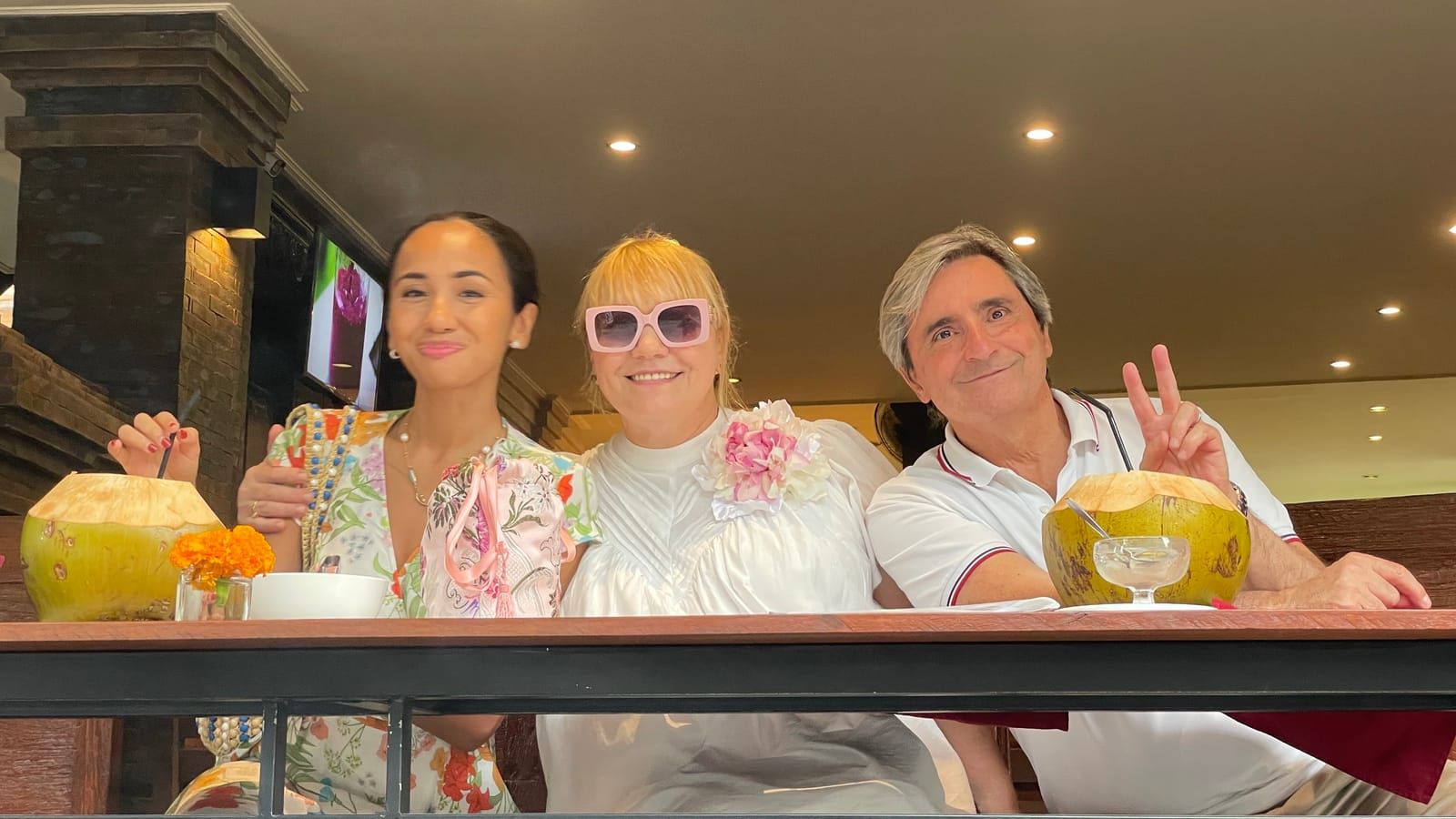 Family gathering around the kitchen table